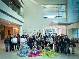 A group of people posing for a photo at a LCI Stamford event.